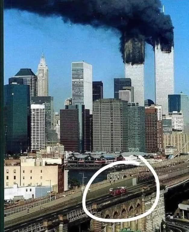 The Haunting True Story Behind the Iconic 9/11 Photo of a Fire Truck Bound for the Twin Towers